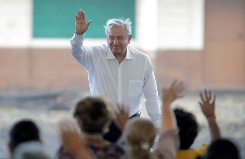 FILE PHOTO: Mexico’s President Andres Manuel Lopez Obrador waves during
