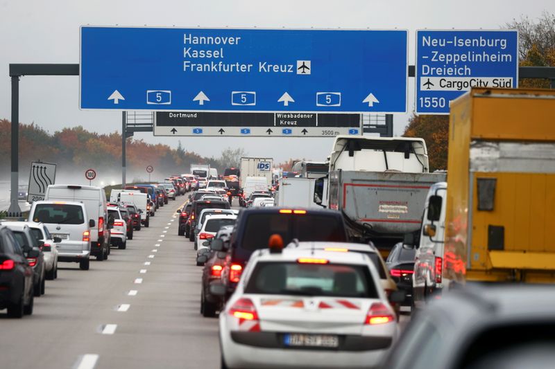 Activists hang on a bridge of A5 highway near Frankfurt