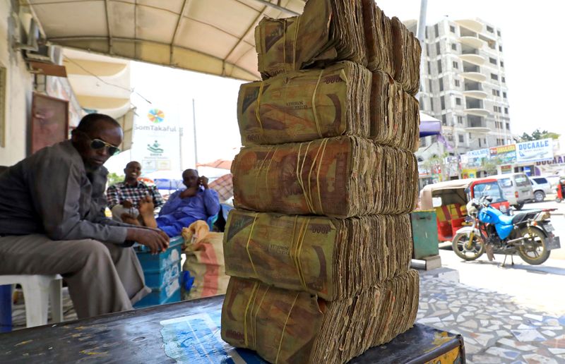 FILE PHOTO: Bundles of Somalian currency are seen arranged at
