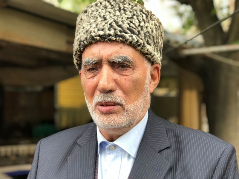 Gassan Akhmedov, an 80-year-old elder of a refugee neighbourhood, talks