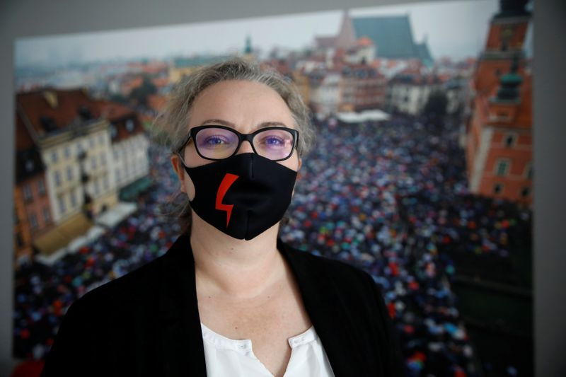 Marta Lampert, leader of movement Strajk Kobiet (Women’s Strike), wears