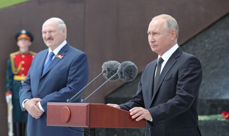 FILE PHOTO: Russian President Putin and his Belarusian counterpart Lukashenko