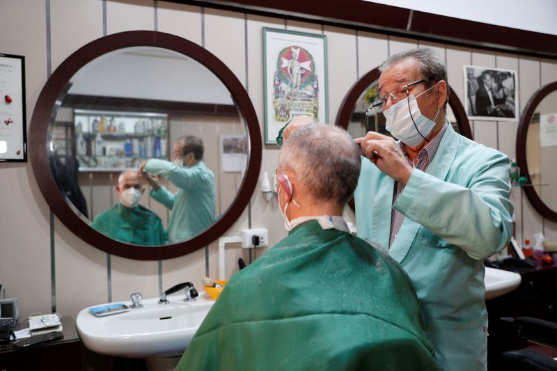Italian hairdresser hangs up his scissors after 60 years spooked