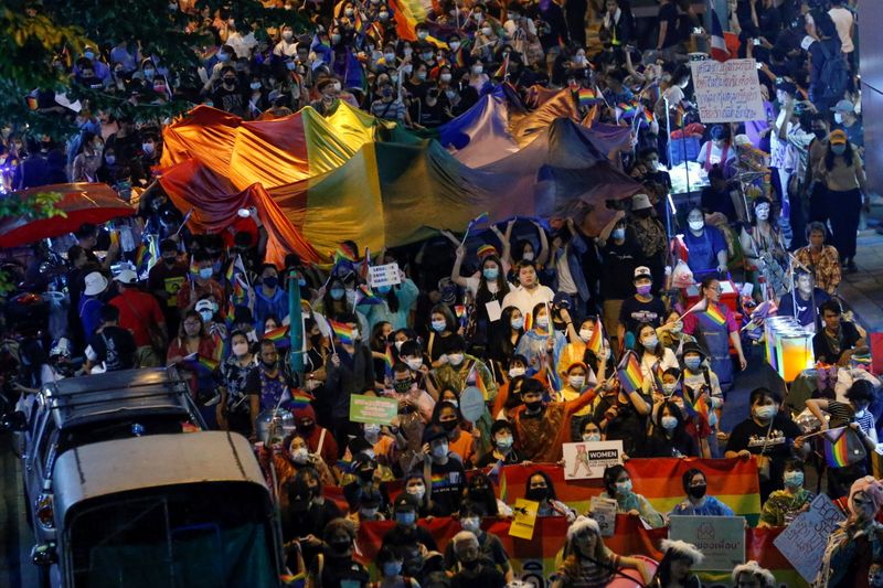 Thai anti-government protesters from the LGBT community hold a pride