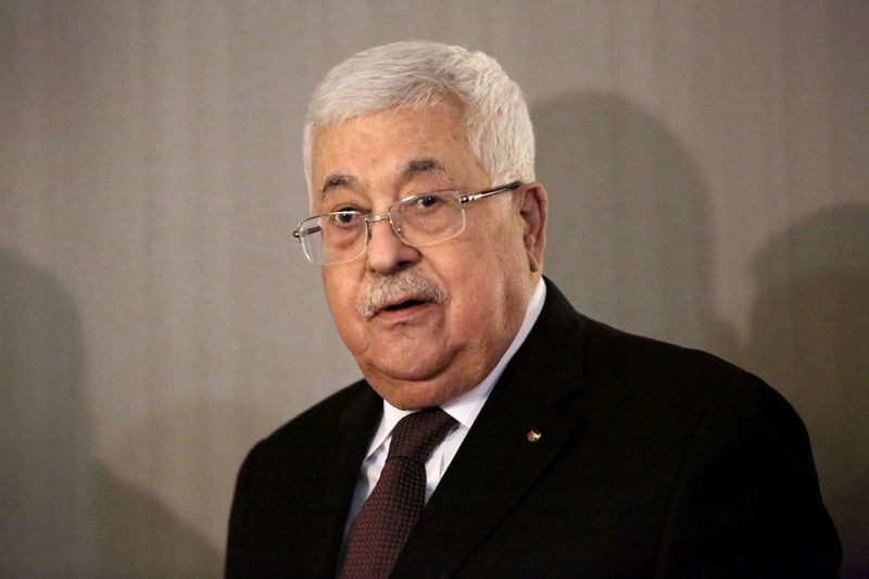 Palestinian President Mahmoud Abbas and former Israeli Prime Minister Ehud