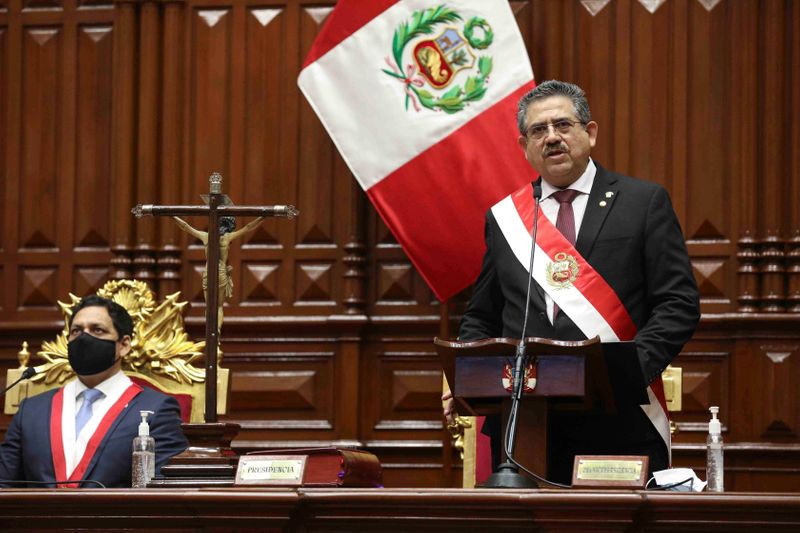 Peru’s interim President Manuel Merino addresses lawmakers at Congress after