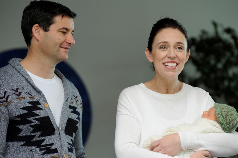 FILE PHOTO: New Zealand Prime Minister Jacinda Ardern carries her