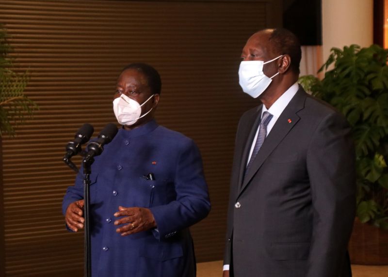 Ivory Coast former president Henri Konan Bedie talks while he