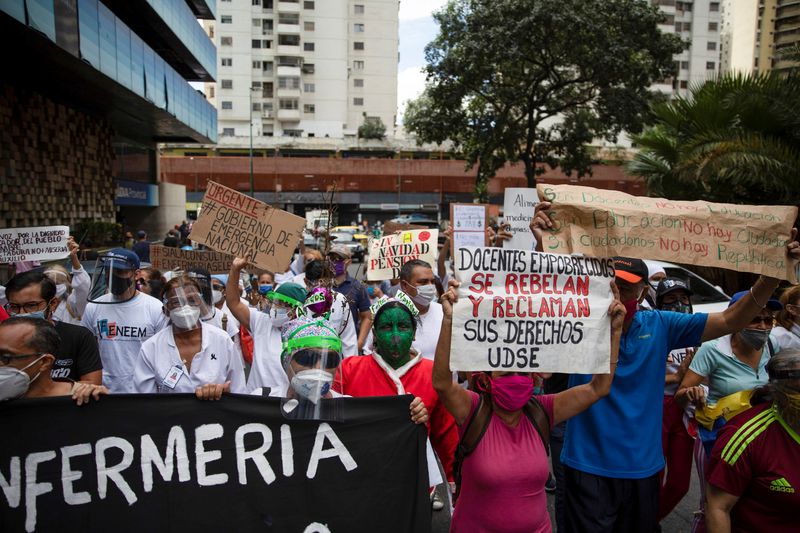 Guillen participates in a protest against low wages in Caracas