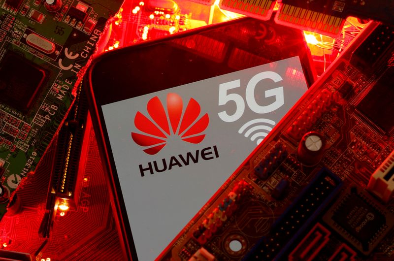 FILE PHOTO: A smartphone with the Huawei and 5G network