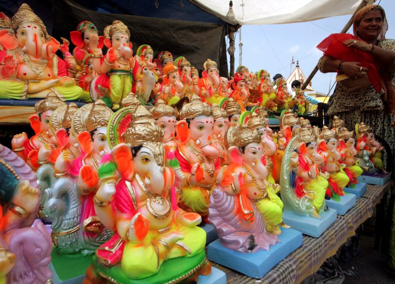 FILE PHOTO: A devotee buys an idol of Hindu elephant