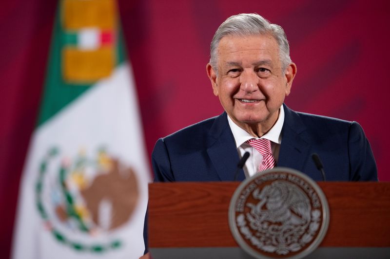Mexico’s President Andres Manuel Lopez Obrador looks on during a