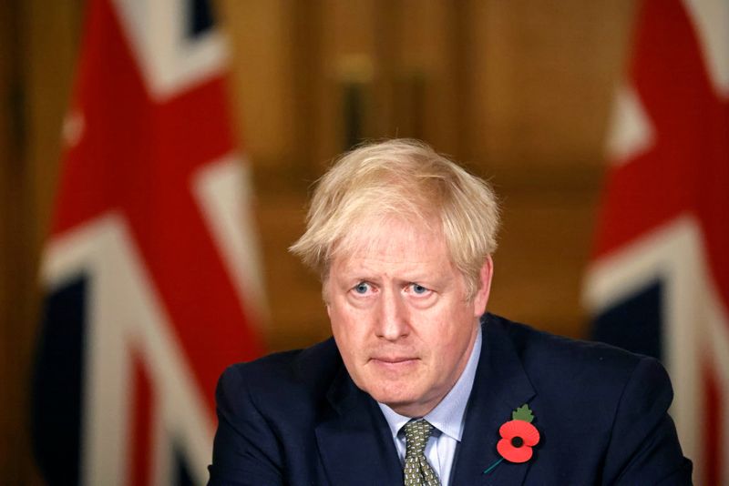 Britain’s PM Johnson holds news conference on COVID-19