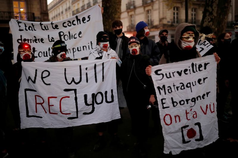 FILE PHOTO: Protests in France over proposed curbs on identifying