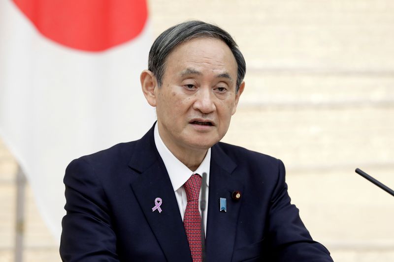 FILE PHOTO: Yoshihide Suga, Japan’s prime minister, speaks during a