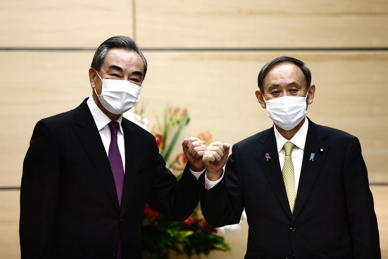 Japan’s PM Suga meets China’s State Councillor Yi in Tokyo