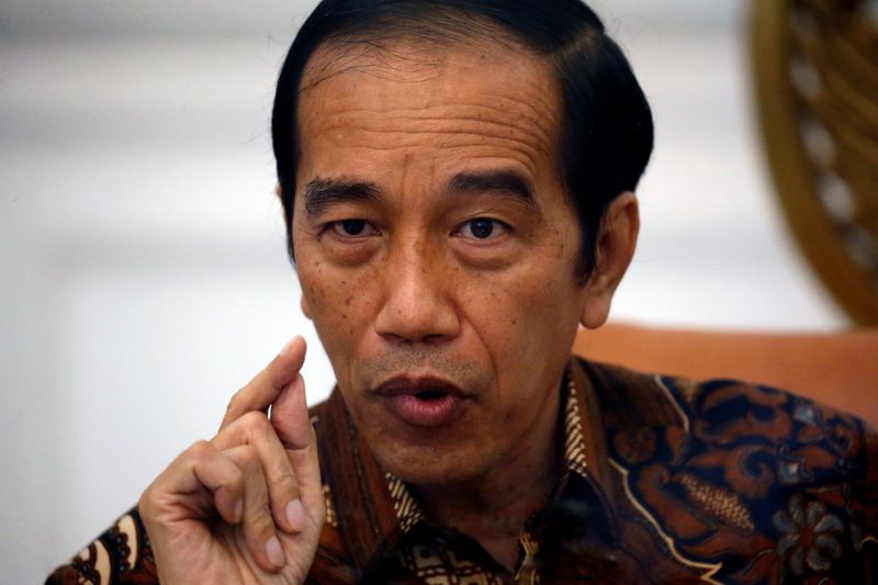 Indonesian President Joko Widodo gestures during an interview with Reuters