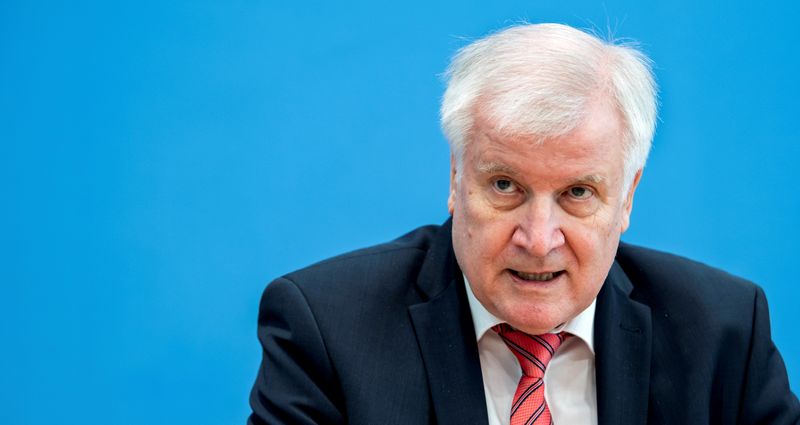 FILE PHOTO: News conference of German Interior Minister Seehofer on