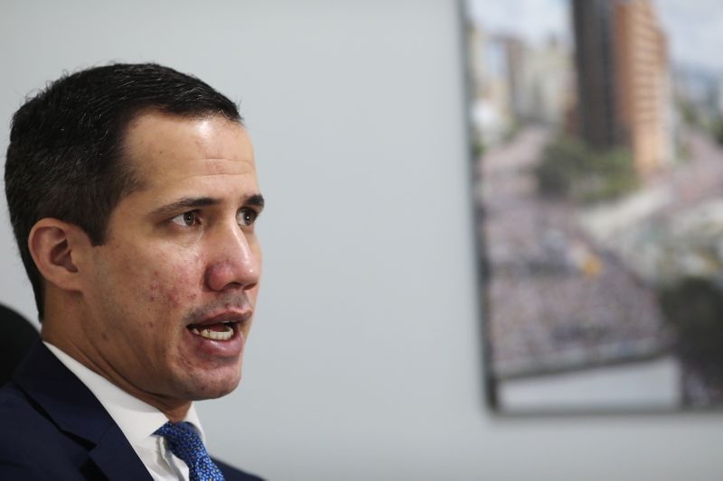 Venezuela’s opposition leader Juan Guaido speaks during an interview with