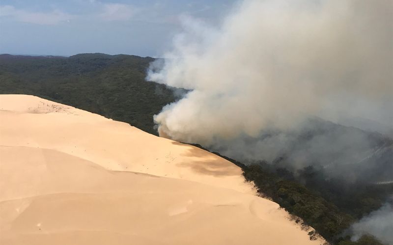 FILE PHOTO: Bushfire in Australia’s Fraser Island