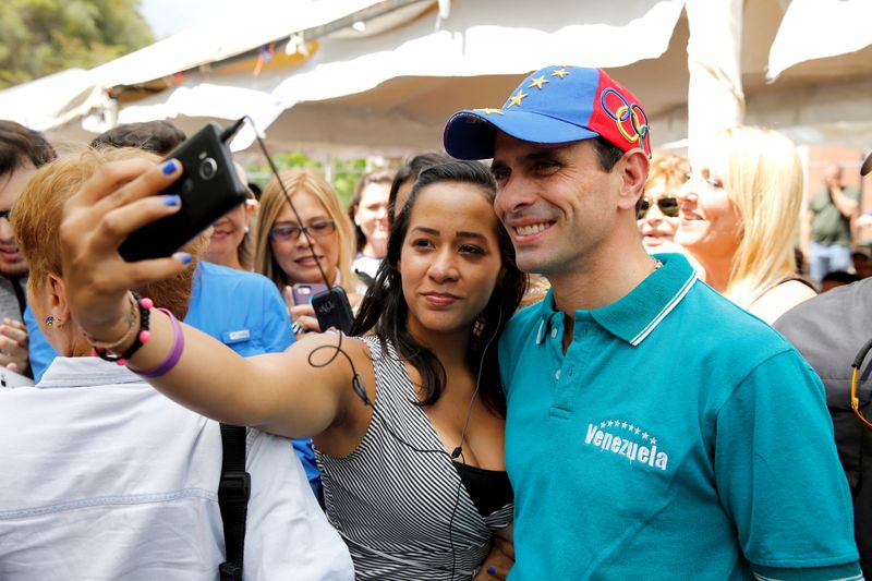 FILE PHOTO: Venezuelan opposition leader Henrique Capriles is shown with
