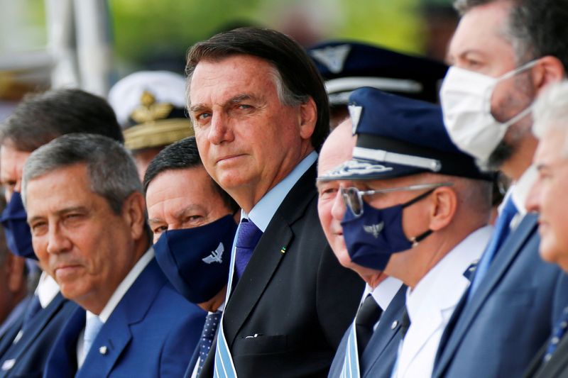FILE PHOTO: Brazil’s President Jair Bolsonaro looks on during a
