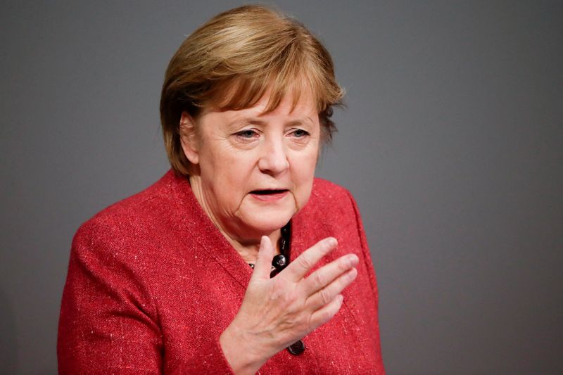 FILE PHOTO: German Chancellor Angela Merkel delivers a speech in