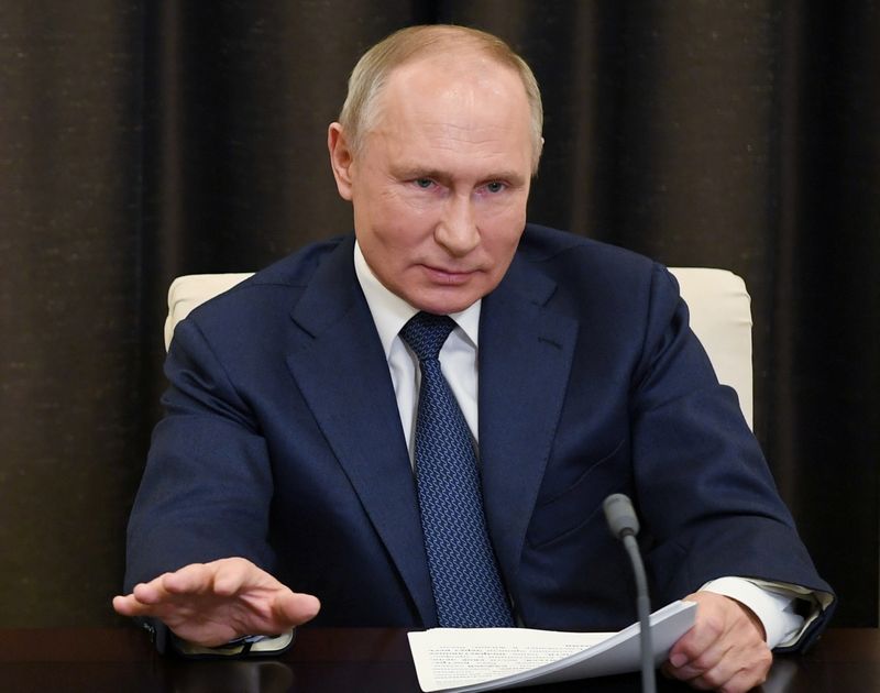 Russian President Putin attends a conference via a video link