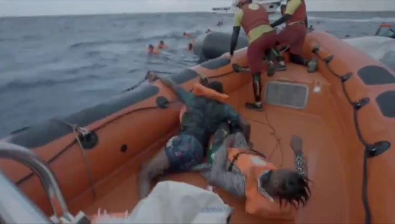FILE PHOTO: Migrants are rescued by Spanish search and rescue