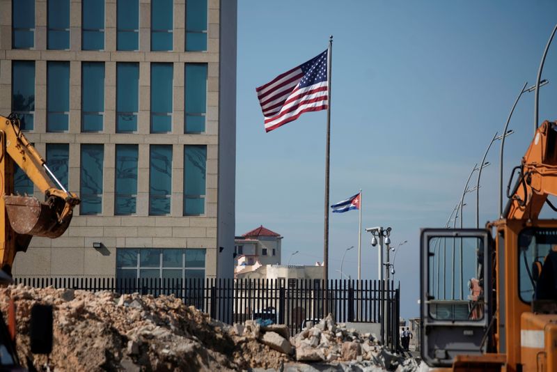 FILE PHOTO: A view of Cuban and American flags beside