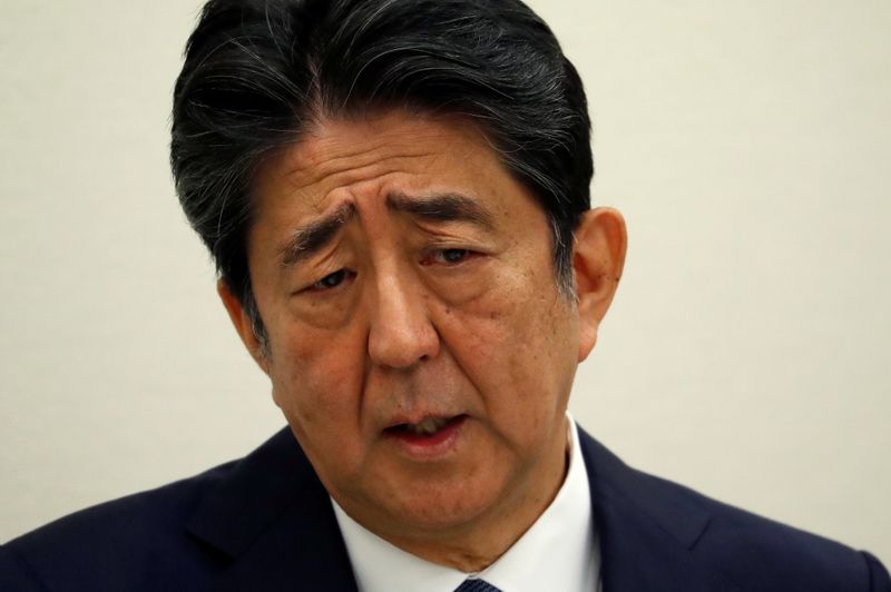 Former Japanese PM Shinzo Abe holds a news conference in