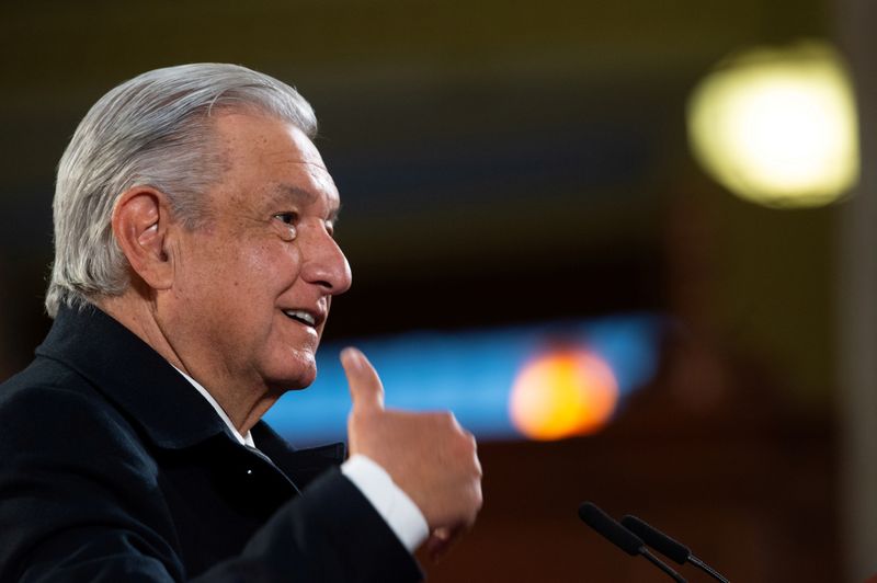 FILE PHOTO: Mexico’s President Andres Manuel Lopez Obrador holds a