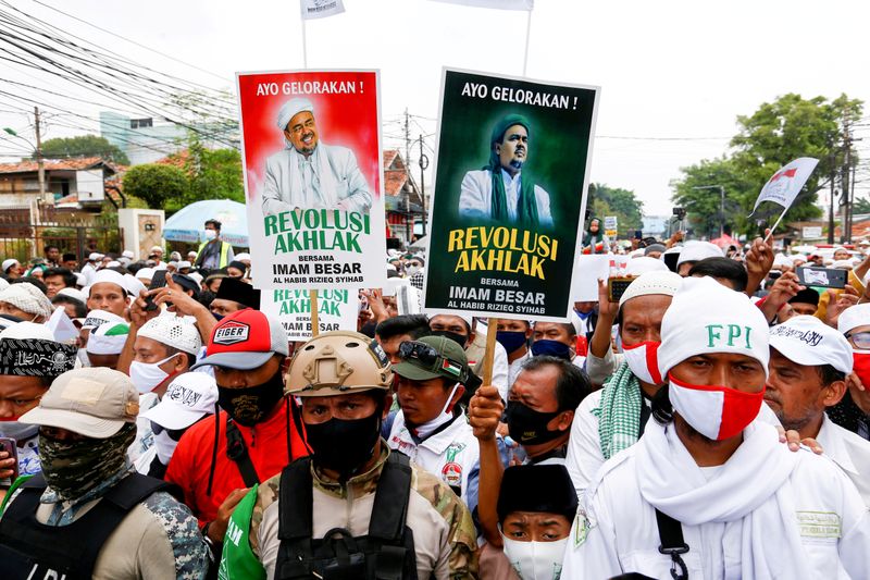 FILE PHOTO: People gather for the homecoming of Rizieq Shihab,