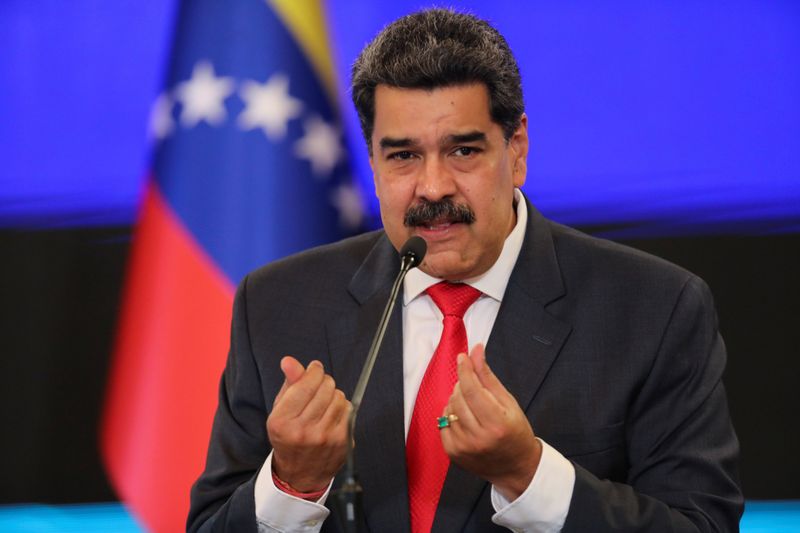 FILE PHOTO: Venezuelan President Nicolas Maduro holds a press conference