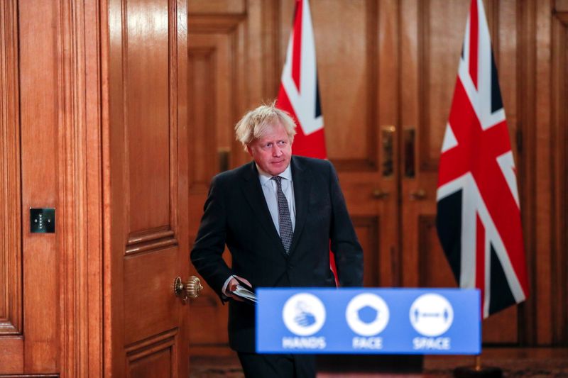 Britain’s PM Johnson holds a news conference at Downing Street