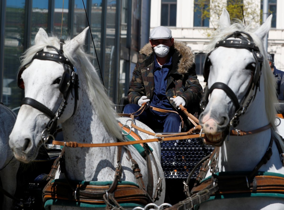 A Fiaker horse carriage delivers food in Vienna