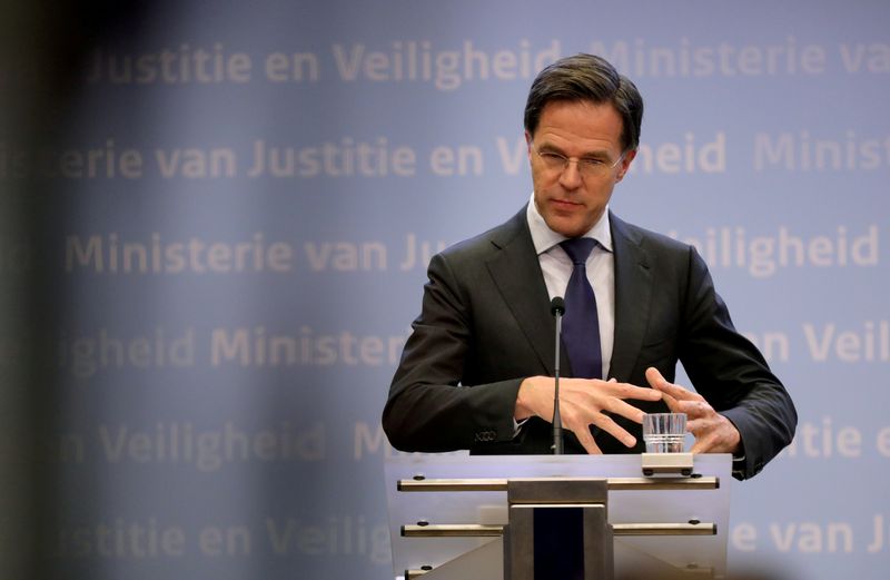 FILE PHOTO: Dutch Prime Minister Mark Rutte holds a news