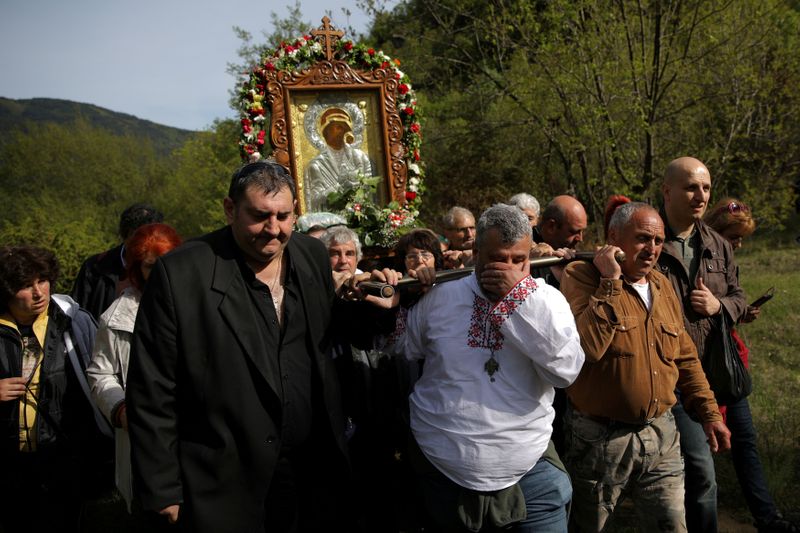 FILE PHOTO: Orthodox Christians carry an icon of the Virgin