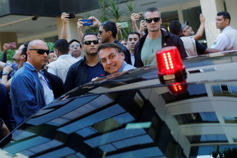 Brazil’s President Jair Bolsonaro is seen in a neighbourhood Sudoeste,