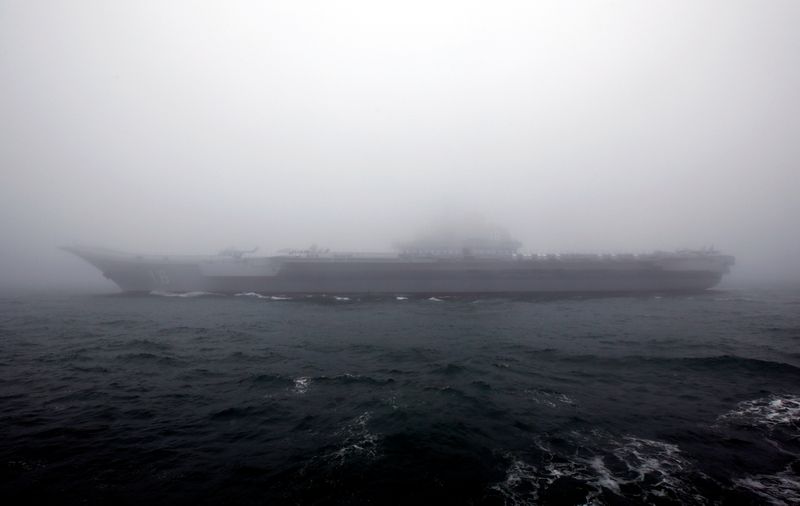 FILE PHOTO: Chinese Navy’s Aircraft carrier Liaoning takes part in