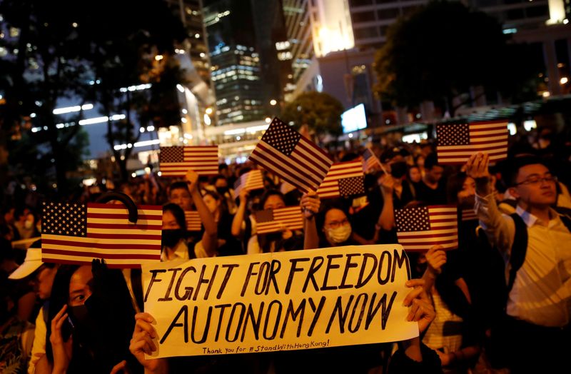 FILE PHOTO: A banner is seen as anti-government demonstrators march