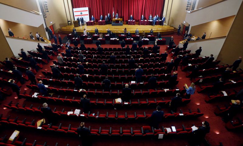 Lebanese members of Parliament attend a legislative session in a