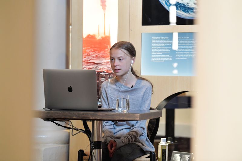 Environmental activist Greta Thunberg participates in a video conversation with