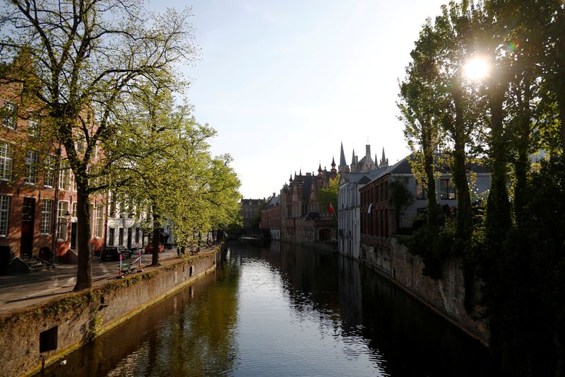 A view of the deserted old town of Bruges amid