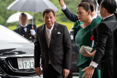 Philippines President Rodrigo Duterte arrives to attend the enthronement ceremony
