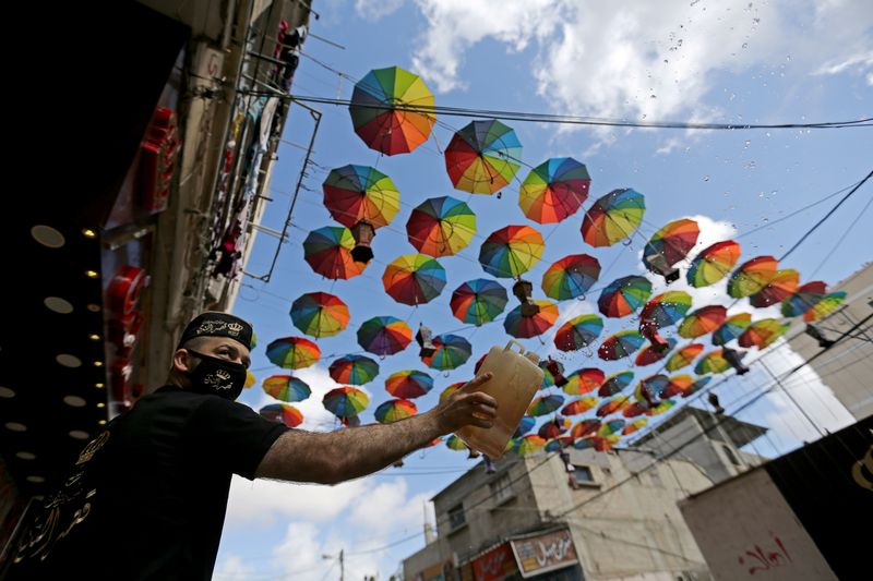 Palestinians prepare for the holy fasting month of Ramadan, amid