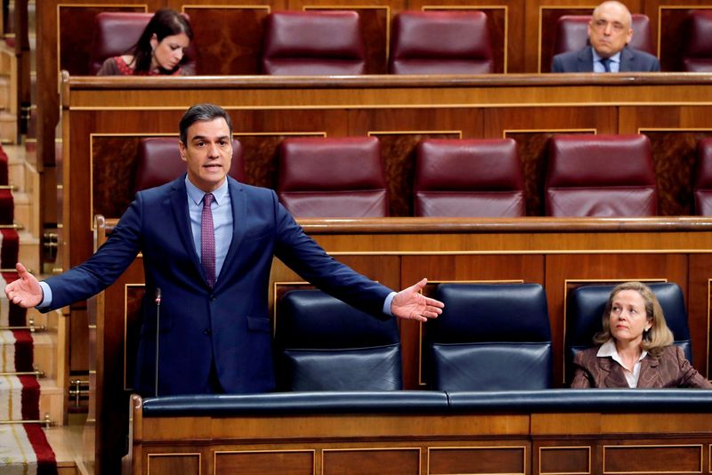 FILE PHOTO: Spanish PM Sanchez answers questions during a control