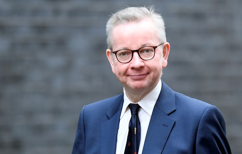 Michael Gove arrives at Downing Street in London