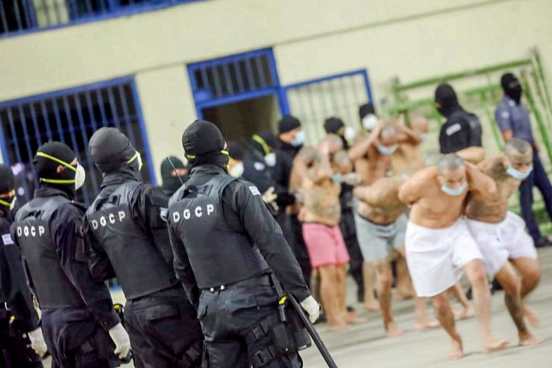 El Salvador lines up semi-naked gang members for grim 