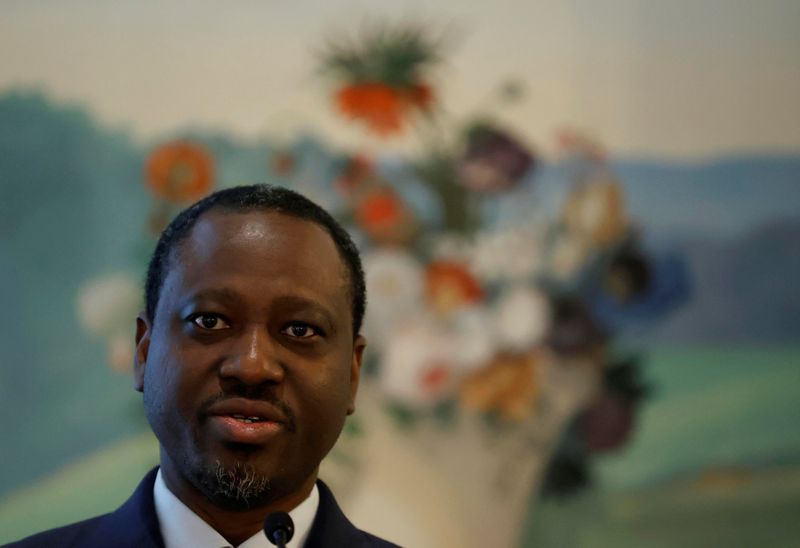 Former Ivory Coast rebel leader Guillaume Soro attends a media